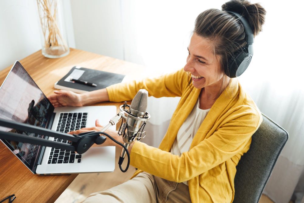 woman recording a podcast